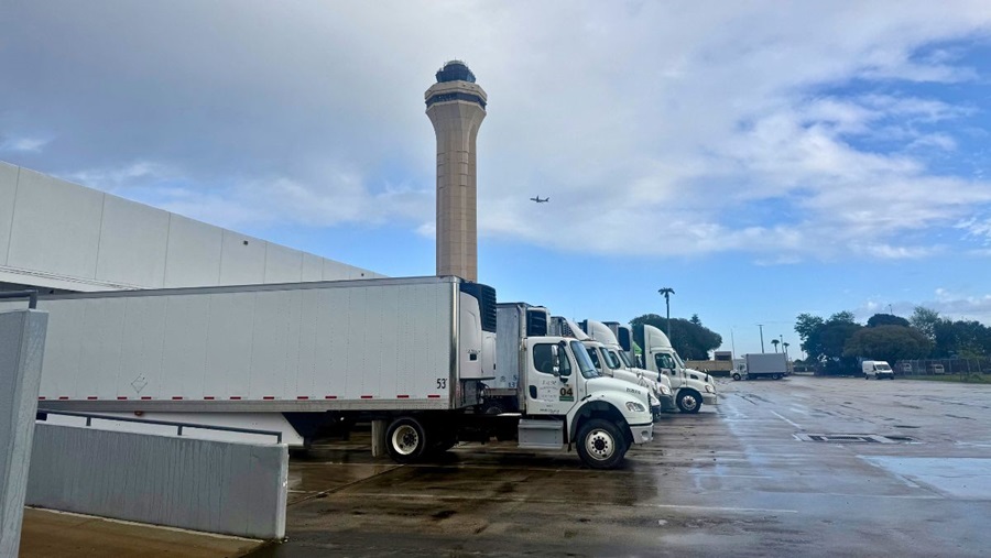 Trucks being loaded at warehouse